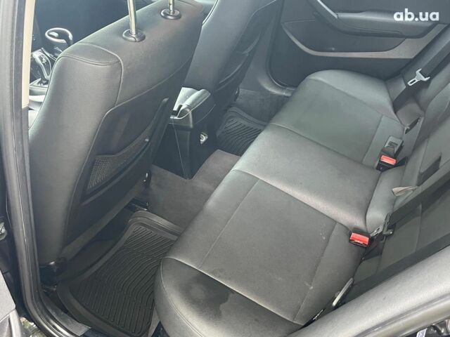 Чорний БМВ Х1, об'ємом двигуна 2 л та пробігом 345 тис. км за 11490 $, фото 20 на Automoto.ua