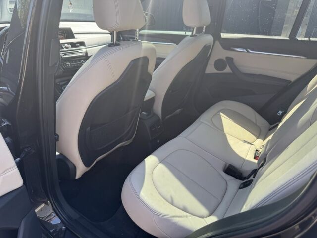 Чорний БМВ Х1, об'ємом двигуна 2 л та пробігом 235 тис. км за 17000 $, фото 4 на Automoto.ua