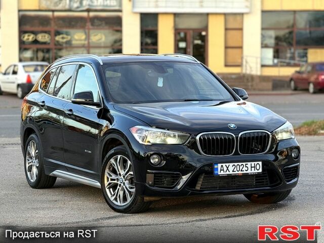 Черный БМВ Х1, объемом двигателя 2 л и пробегом 180 тыс. км за 18000 $, фото 1 на Automoto.ua