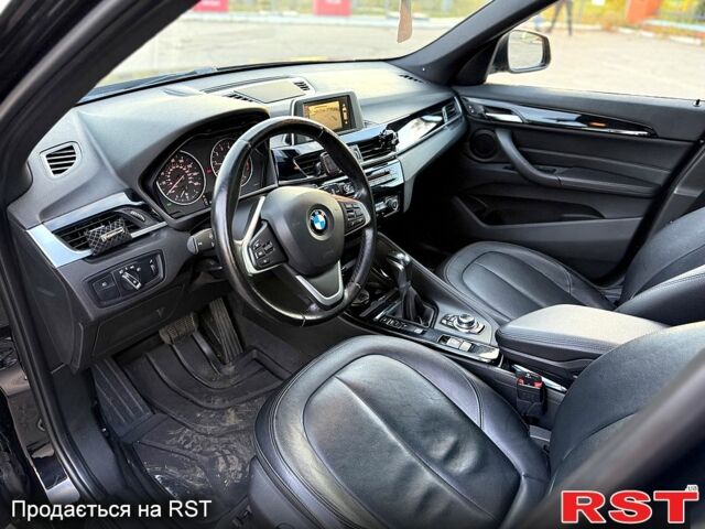 Черный БМВ Х1, объемом двигателя 2 л и пробегом 180 тыс. км за 18000 $, фото 4 на Automoto.ua