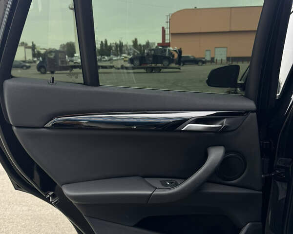 Чорний БМВ Х1, об'ємом двигуна 2 л та пробігом 104 тис. км за 15800 $, фото 29 на Automoto.ua