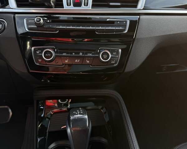 Чорний БМВ Х1, об'ємом двигуна 2 л та пробігом 174 тис. км за 16500 $, фото 1 на Automoto.ua