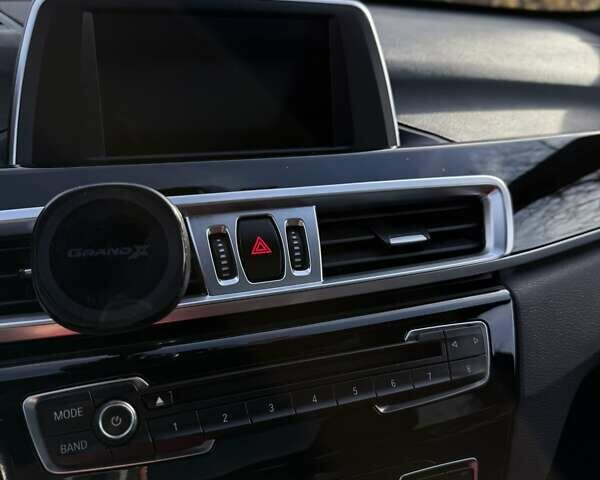 Чорний БМВ Х1, об'ємом двигуна 2 л та пробігом 174 тис. км за 16500 $, фото 4 на Automoto.ua