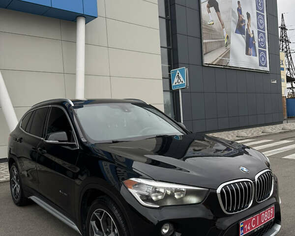 Чорний БМВ Х1, об'ємом двигуна 2 л та пробігом 104 тис. км за 15800 $, фото 3 на Automoto.ua