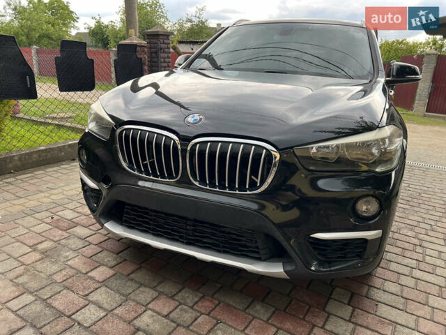 Чорний БМВ Х1, об'ємом двигуна 2 л та пробігом 124 тис. км за 12500 $, фото 2 на Automoto.ua