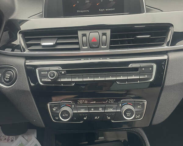 Черный БМВ Х1, объемом двигателя 2 л и пробегом 150 тыс. км за 14900 $, фото 4 на Automoto.ua