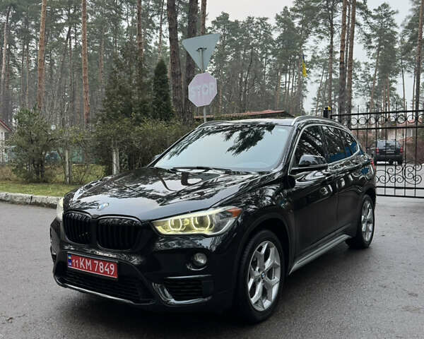 Черный БМВ Х1, объемом двигателя 2 л и пробегом 170 тыс. км за 16900 $, фото 1 на Automoto.ua