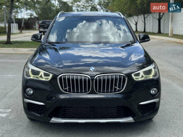 Черный БМВ Х1, объемом двигателя 2 л и пробегом 75 тыс. км за 13500 $, фото 1 на Automoto.ua