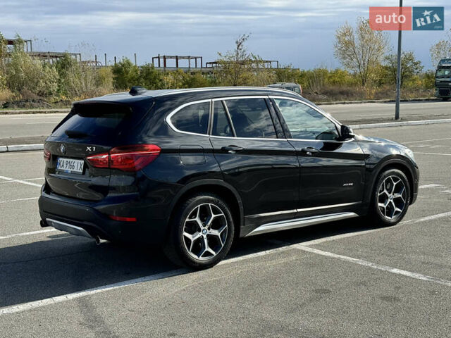 Чорний БМВ Х1, об'ємом двигуна 2 л та пробігом 157 тис. км за 21000 $, фото 4 на Automoto.ua