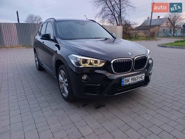 Чорний БМВ Х1, об'ємом двигуна 2 л та пробігом 99 тис. км за 21700 $, фото 1 на Automoto.ua