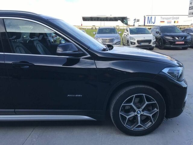 Чорний БМВ Х1, об'ємом двигуна 2 л та пробігом 195 тис. км за 19990 $, фото 2 на Automoto.ua
