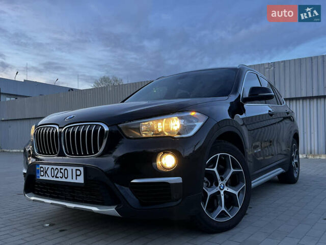 Черный БМВ Х1, объемом двигателя 2 л и пробегом 92 тыс. км за 21999 $, фото 1 на Automoto.ua