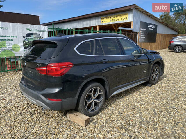 Чорний БМВ Х1, об'ємом двигуна 2 л та пробігом 115 тис. км за 12700 $, фото 2 на Automoto.ua