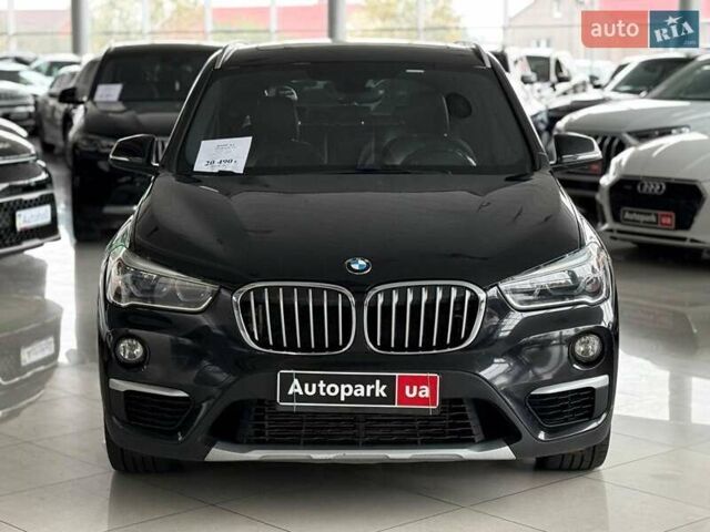 Чорний БМВ Х1, об'ємом двигуна 2 л та пробігом 107 тис. км за 20290 $, фото 1 на Automoto.ua