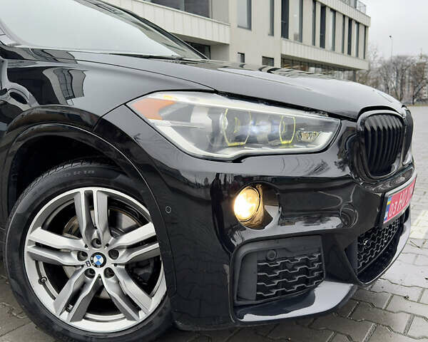 Черный БМВ Х1, объемом двигателя 2 л и пробегом 185 тыс. км за 18999 $, фото 2 на Automoto.ua