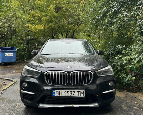 Черный БМВ Х1, объемом двигателя 2 л и пробегом 107 тыс. км за 21500 $, фото 1 на Automoto.ua