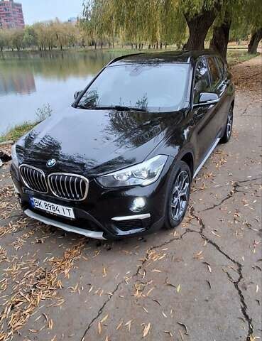 Черный БМВ Х1, объемом двигателя 2 л и пробегом 101 тыс. км за 15999 $, фото 2 на Automoto.ua
