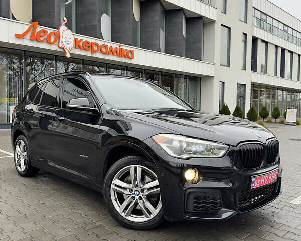 Черный БМВ Х1, объемом двигателя 2 л и пробегом 185 тыс. км за 18999 $, фото 1 на Automoto.ua