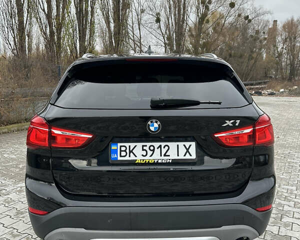 Черный БМВ Х1, объемом двигателя 2 л и пробегом 115 тыс. км за 17850 $, фото 4 на Automoto.ua