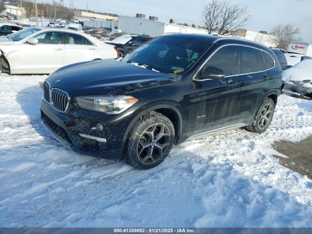 Черный БМВ Х1, объемом двигателя 2 л и пробегом 143 тыс. км за 13900 $, фото 2 на Automoto.ua