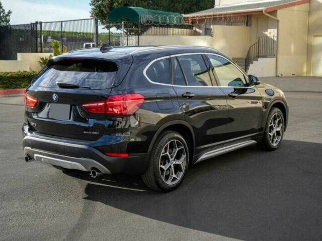 Чорний БМВ Х1, об'ємом двигуна 2 л та пробігом 45 тис. км за 4200 $, фото 2 на Automoto.ua