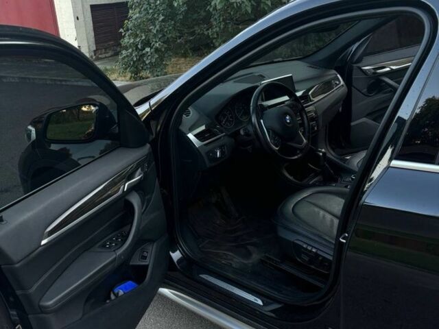 Чорний БМВ Х1, об'ємом двигуна 2 л та пробігом 148 тис. км за 19900 $, фото 2 на Automoto.ua