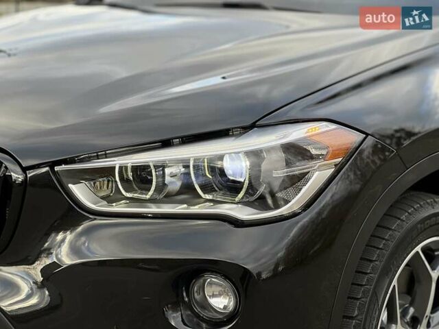 Черный БМВ Х1, объемом двигателя 2 л и пробегом 73 тыс. км за 19900 $, фото 1 на Automoto.ua