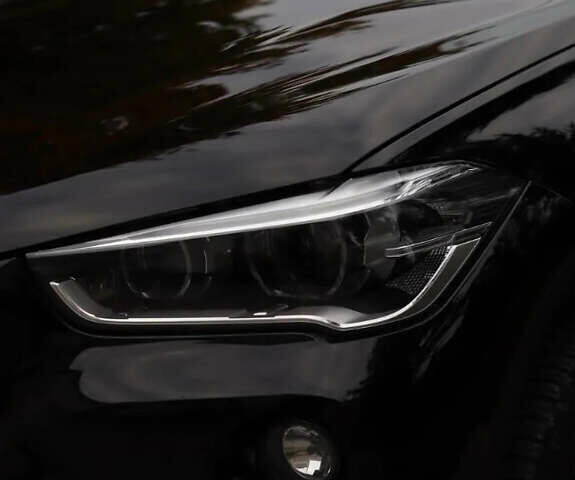 Черный БМВ Х1, объемом двигателя 2 л и пробегом 138 тыс. км за 22999 $, фото 2 на Automoto.ua