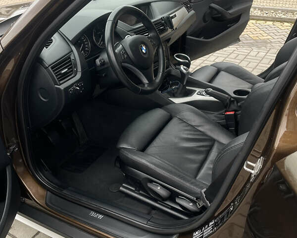 Коричневий БМВ Х1, об'ємом двигуна 2 л та пробігом 187 тис. км за 11444 $, фото 14 на Automoto.ua