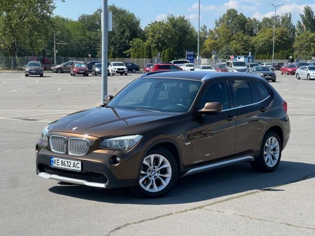 Коричневый БМВ Х1, объемом двигателя 2 л и пробегом 242 тыс. км за 11000 $, фото 1 на Automoto.ua
