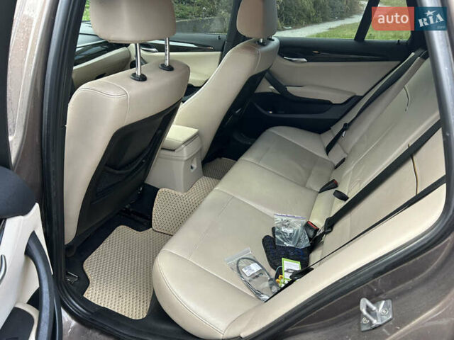 Коричневий БМВ Х1, об'ємом двигуна 2 л та пробігом 265 тис. км за 11000 $, фото 7 на Automoto.ua