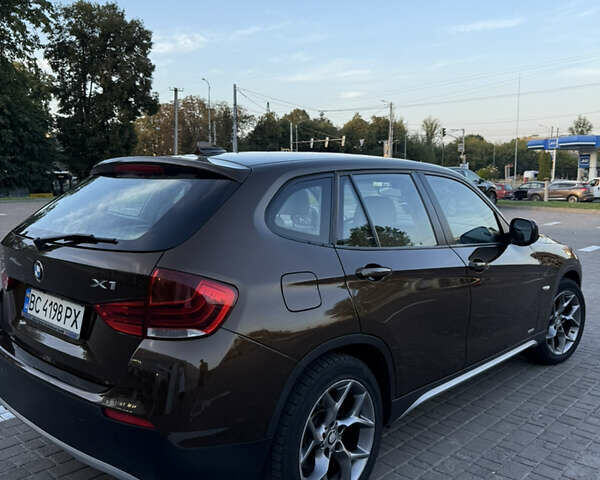 Коричневый БМВ Х1, объемом двигателя 2 л и пробегом 138 тыс. км за 13699 $, фото 5 на Automoto.ua