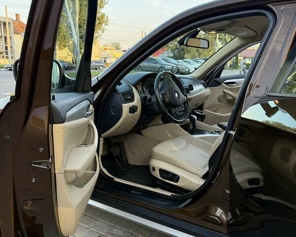 Коричневый БМВ Х1, объемом двигателя 2 л и пробегом 138 тыс. км за 13699 $, фото 15 на Automoto.ua