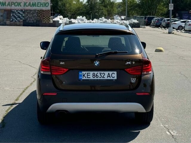 Коричневый БМВ Х1, объемом двигателя 2 л и пробегом 242 тыс. км за 11000 $, фото 4 на Automoto.ua