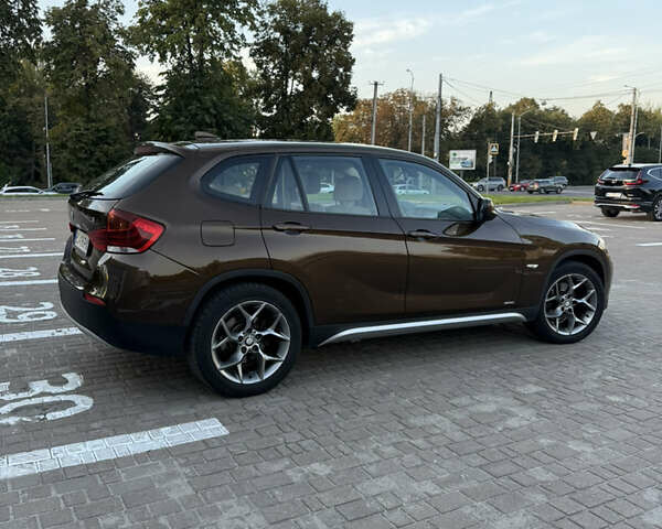 Коричневый БМВ Х1, объемом двигателя 2 л и пробегом 138 тыс. км за 13699 $, фото 6 на Automoto.ua