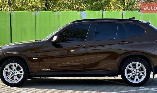 Коричневый БМВ Х1, объемом двигателя 3 л и пробегом 157 тыс. км за 9900 $, фото 3 на Automoto.ua