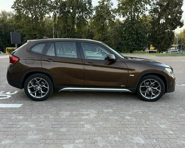 Коричневый БМВ Х1, объемом двигателя 2 л и пробегом 138 тыс. км за 13699 $, фото 7 на Automoto.ua