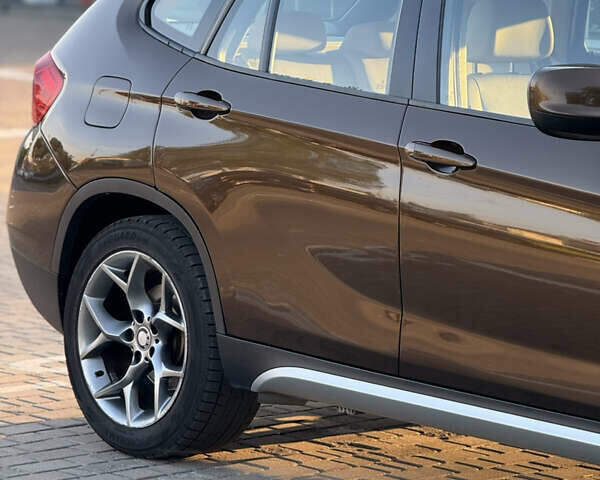 Коричневый БМВ Х1, объемом двигателя 2 л и пробегом 138 тыс. км за 13699 $, фото 12 на Automoto.ua