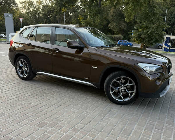 Коричневый БМВ Х1, объемом двигателя 2 л и пробегом 138 тыс. км за 13699 $, фото 2 на Automoto.ua