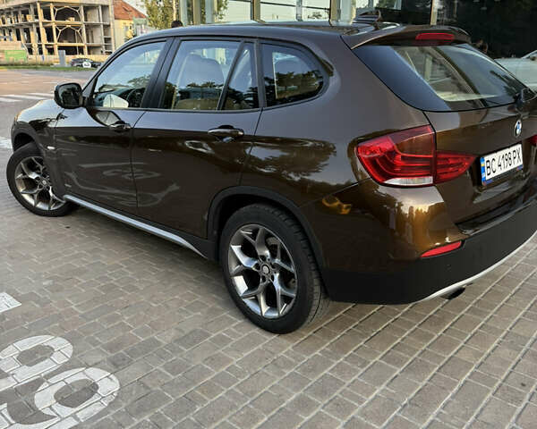 Коричневый БМВ Х1, объемом двигателя 2 л и пробегом 138 тыс. км за 13699 $, фото 3 на Automoto.ua