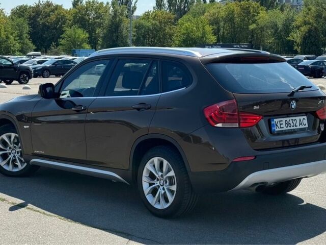 Коричневый БМВ Х1, объемом двигателя 2 л и пробегом 242 тыс. км за 11000 $, фото 3 на Automoto.ua