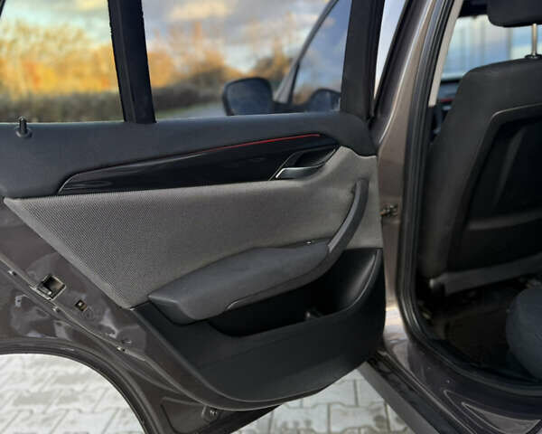 Коричневый БМВ Х1, объемом двигателя 2 л и пробегом 80 тыс. км за 10300 $, фото 30 на Automoto.ua