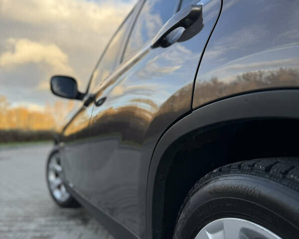 Коричневый БМВ Х1, объемом двигателя 2 л и пробегом 79 тыс. км за 12000 $, фото 14 на Automoto.ua