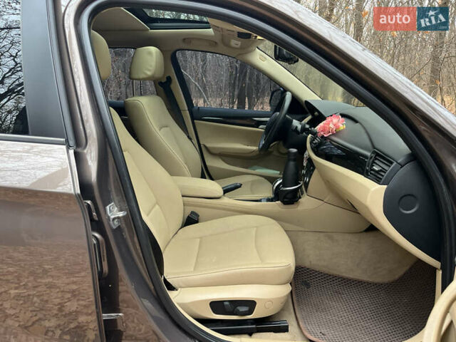 Коричневый БМВ Х1, объемом двигателя 2 л и пробегом 124 тыс. км за 13300 $, фото 9 на Automoto.ua