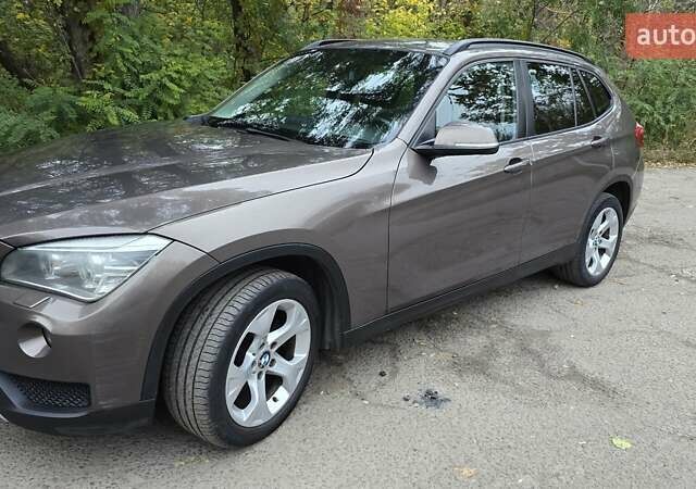 Коричневый БМВ Х1, объемом двигателя 2 л и пробегом 262 тыс. км за 12600 $, фото 5 на Automoto.ua