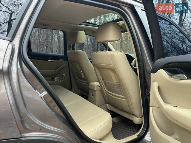 Коричневый БМВ Х1, объемом двигателя 2 л и пробегом 124 тыс. км за 13300 $, фото 12 на Automoto.ua