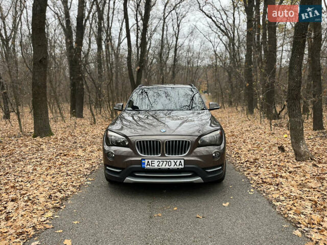 Коричневый БМВ Х1, объемом двигателя 2 л и пробегом 124 тыс. км за 13300 $, фото 1 на Automoto.ua