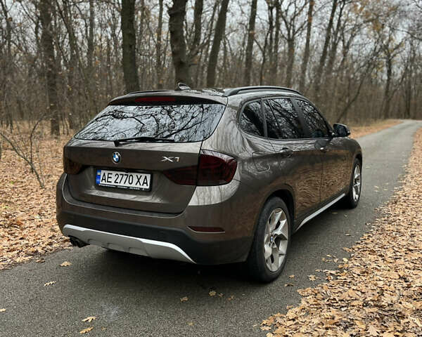Коричневый БМВ Х1, объемом двигателя 2 л и пробегом 124 тыс. км за 13300 $, фото 5 на Automoto.ua