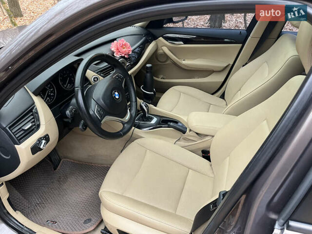 Коричневый БМВ Х1, объемом двигателя 2 л и пробегом 124 тыс. км за 13300 $, фото 7 на Automoto.ua