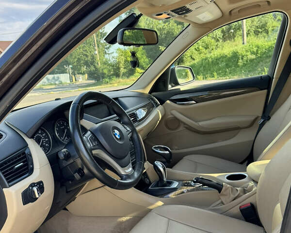 Коричневый БМВ Х1, объемом двигателя 2 л и пробегом 109 тыс. км за 12000 $, фото 7 на Automoto.ua